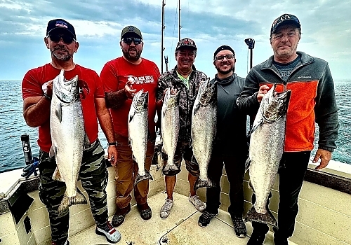 Group poses with their catch